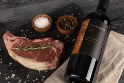 2 Wines + 2 Steaks